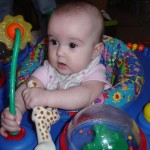 Rissa in the exersaucer we got from Freecycle in April 2011.