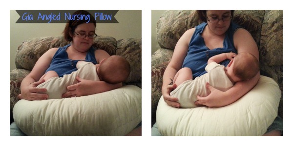 mom nursing baby on pillow
