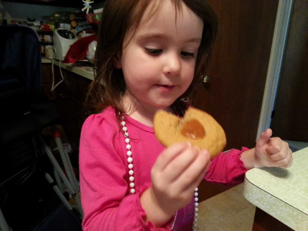 girl eating cookie