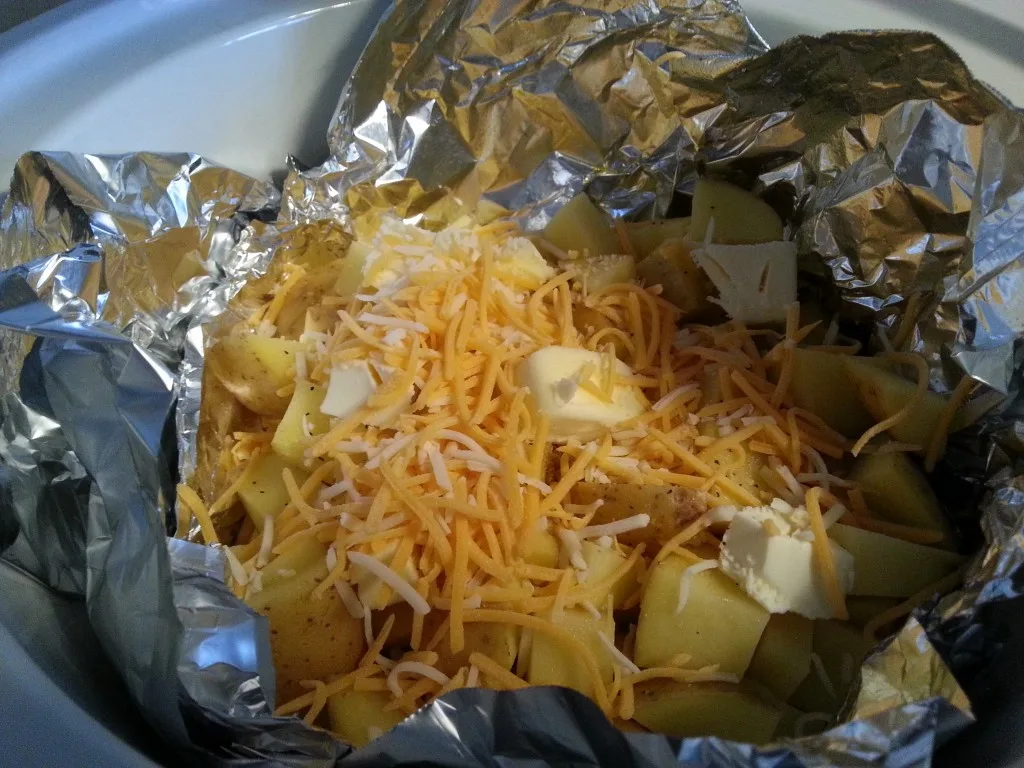 How to make deliciously easy cheesy potatoes in your crock pot or slow cooker