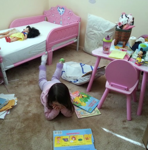 rissa reading on floor