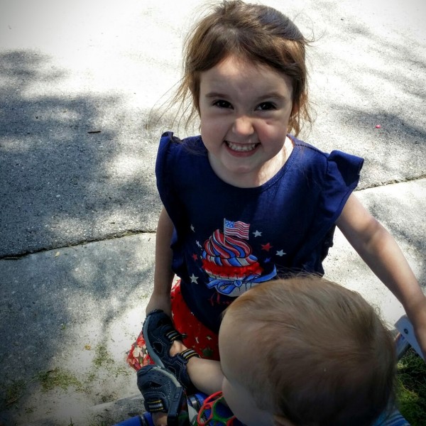 Darcy's daughter at a 4th of July parade