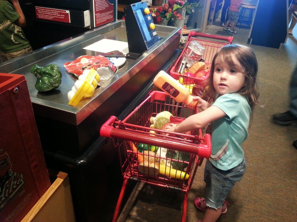 Darcy's daughter in the market at Betty Brinn Children Museum Milwaukee