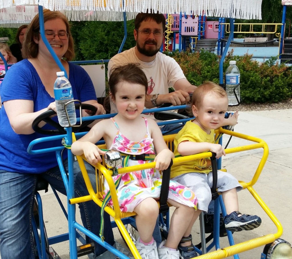 Family on a group bike at Frame Park in Waukesha