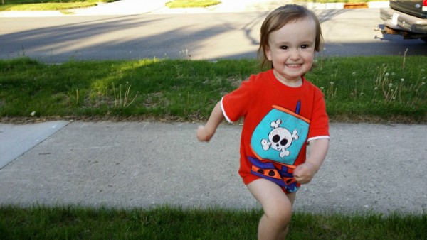 Darcy's toddler son playing outside.