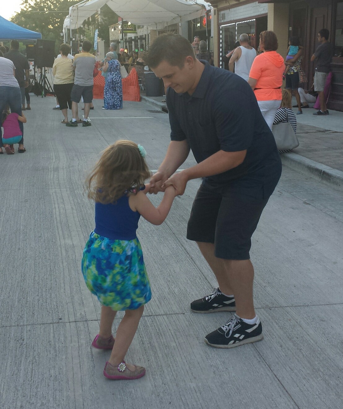 Daddy and daughter dancing at Friday Night Live in Waukesha