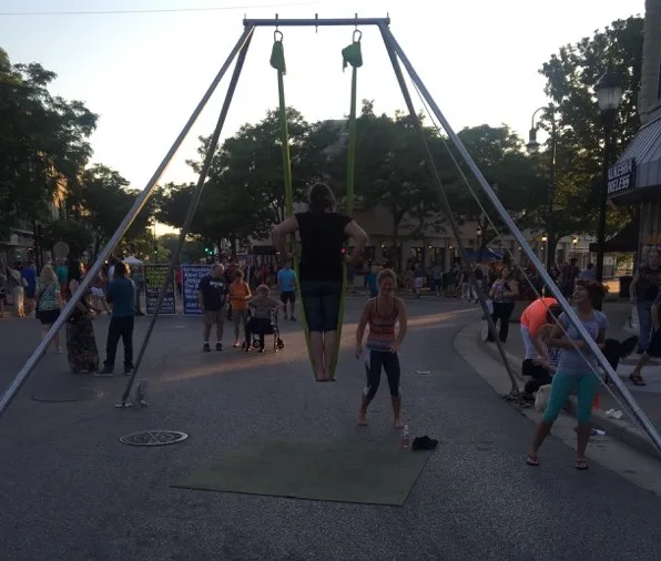 Trapeze yoga at Friday Night Live in Waukesha