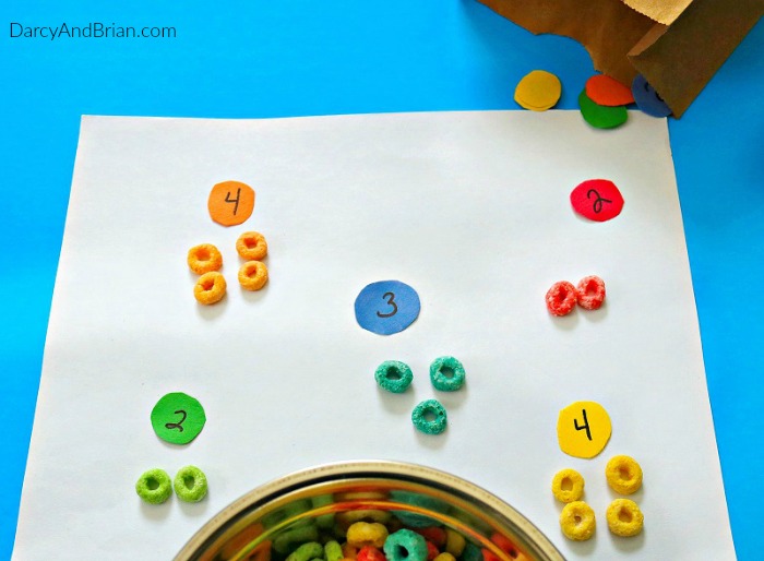 Teaching kids is fun and easy with this simple Fruit Loop Homemade Counting & Matching Game! Grab supplies and have fun with your kids!