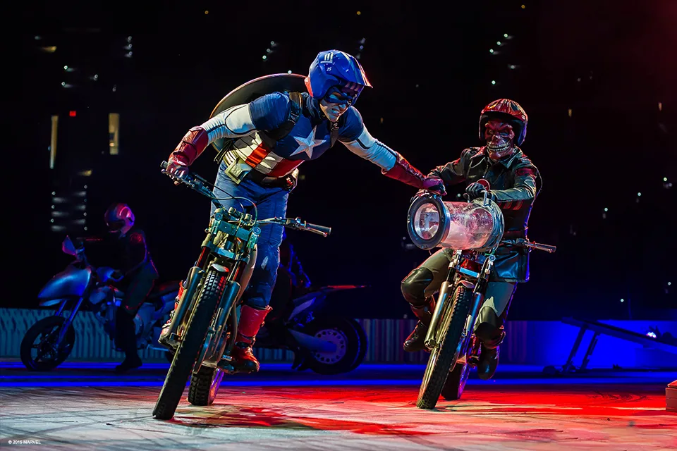 Captain America and Red Skull battle it out as they race their motorcycles around during Marvel Universe Live!