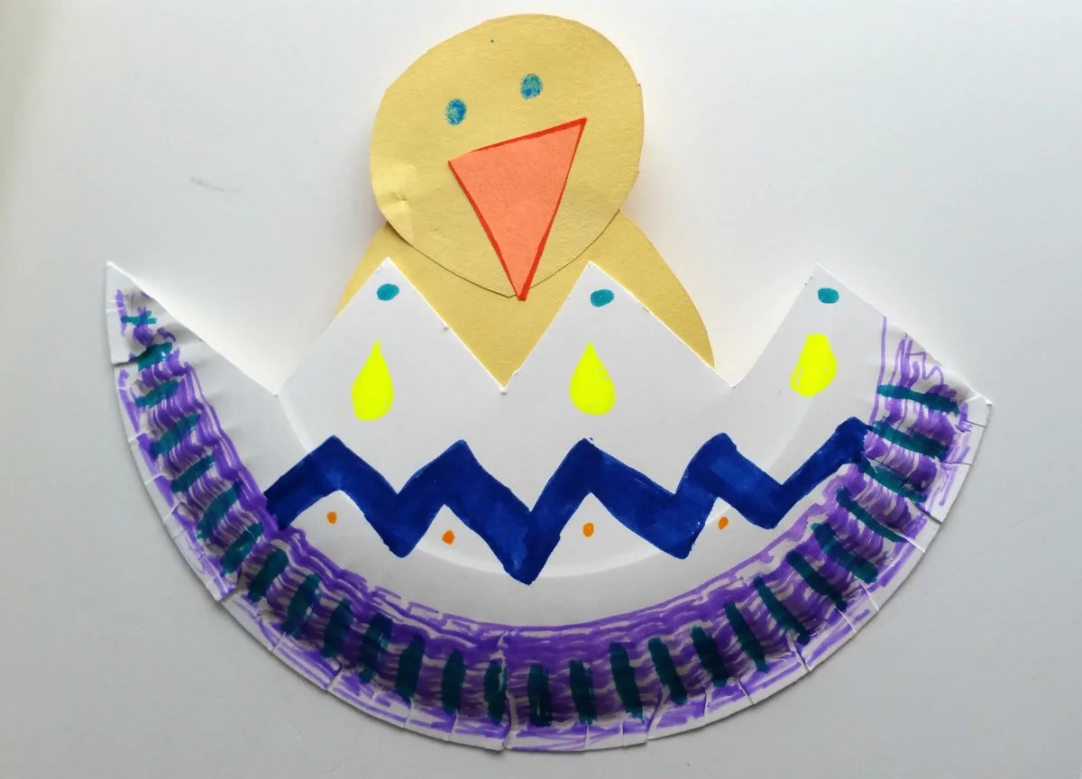 Adorable Hatching Chicken paper plate spring craft.