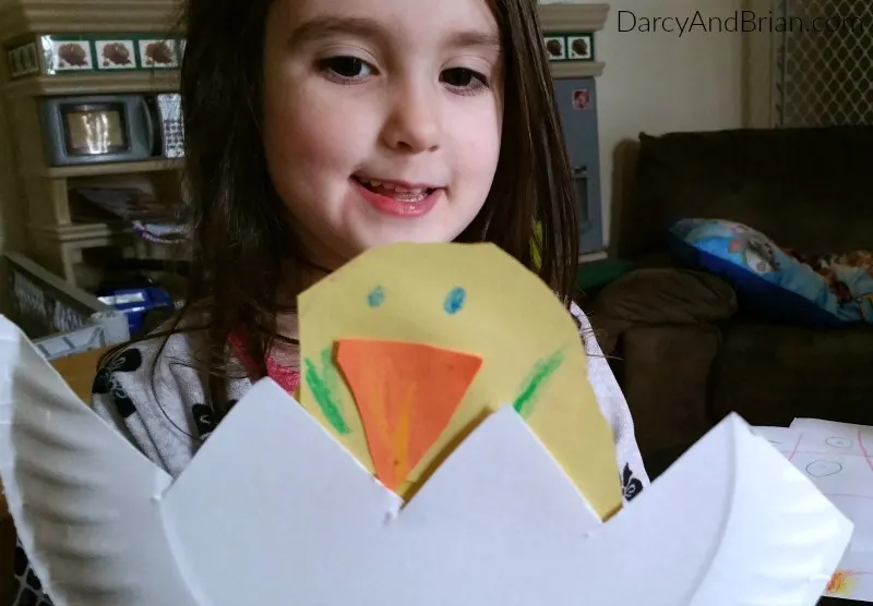 My daughter had fun making her own hatching chicken using paper plates and construction paper.