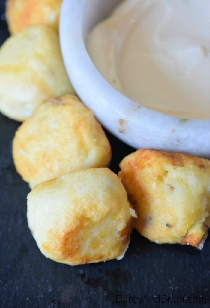 Scrumptious baked cheesy potato bombs are ready to be eaten as a savory side dish or for a party appetizer. This recipe is easy to make!