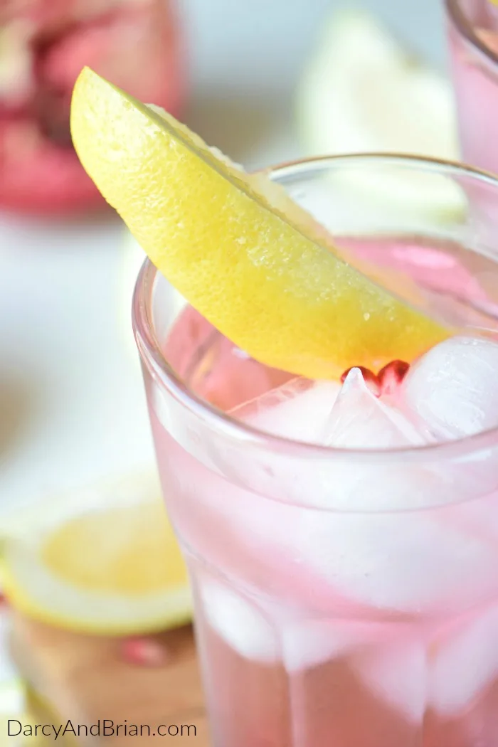 Looking for a refreshing summer drink recipe to serve at your next barbecue? Mix up this Pomegranate Lemon Mocktail for a delicious non-alcoholic tropical drink.