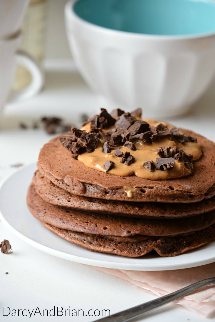 Craving chocolate? Enjoy a sweet start to your day by treating yourself to these Double Chocolate Peanut Butter Pancakes. This pancake recipe is easy to make and is the perfect excuse to have chocolate for breakfast!