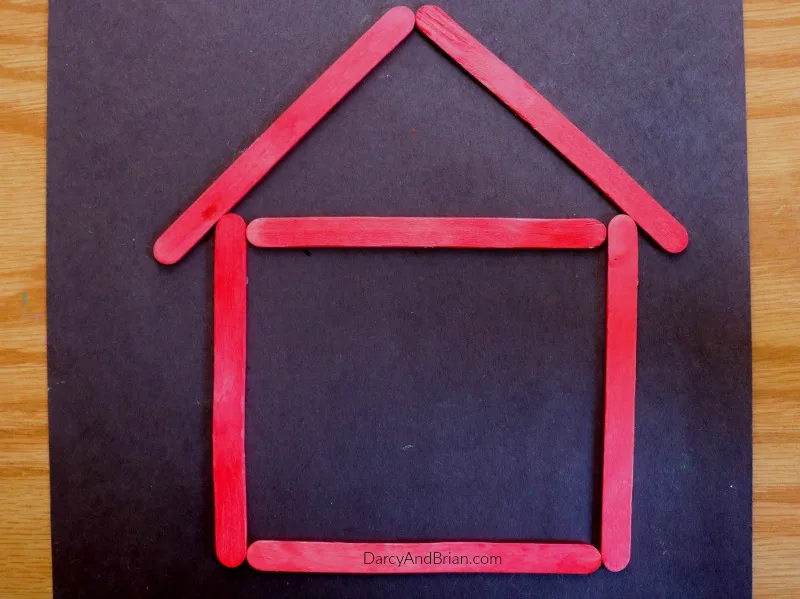 How to make a popsicle stick house magnet with the kids.