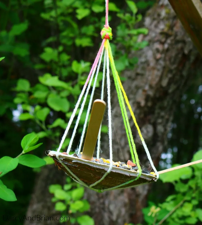 Looking for a fun seashell craft for kids? Let the kids repurpose their beach treasures with this Shell Bird Feeder Craft!