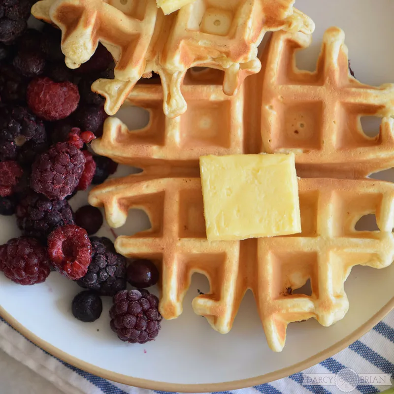 Make everyone's favorite breakfast treat with this easy Buttermilk Waffle Recipe with blackberries. Delicious, easy, and classic! Your family will love this simple homemade waffles recipe that cooks up in minutes in your waffle maker.