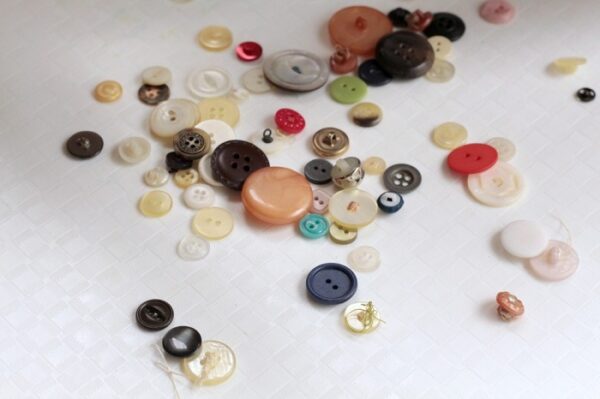 Use buttons for fine motor activities.