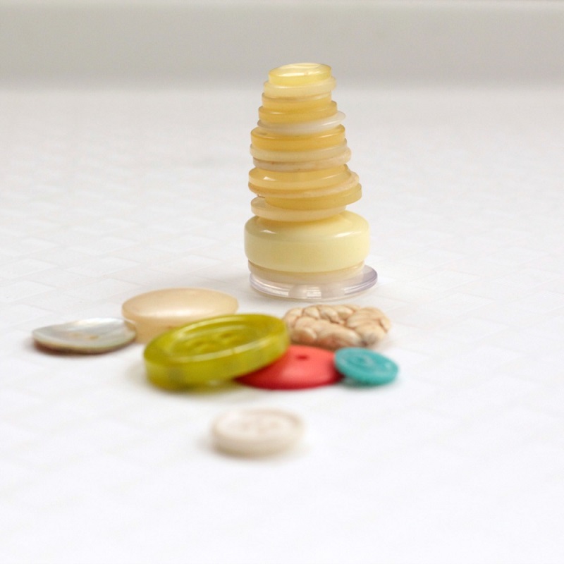 Learn how to use button tower challenges for fine motor activities for kids