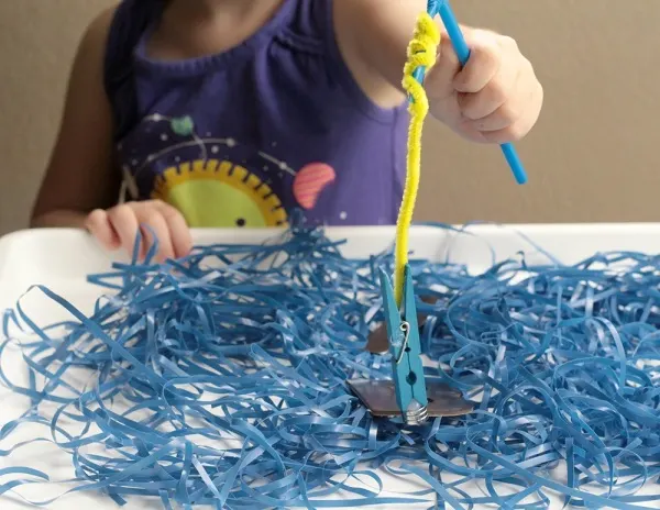 Kids will love this Fishing for Letters Magnetic Sensory Bin! It's a fun hands-on activity that helps young children work on letter recognition. Perfect for preschool and kindergarten age kids!