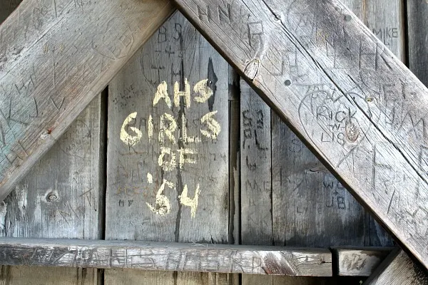 Someone wrote AHS Girls of '54 inside the bridge