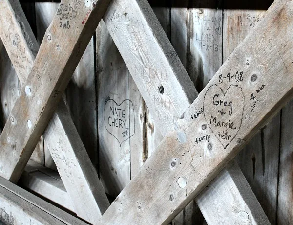 More initials carved into the wood on the bridge