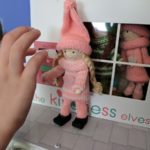 Little girl checking Kindess Elves mailbox
