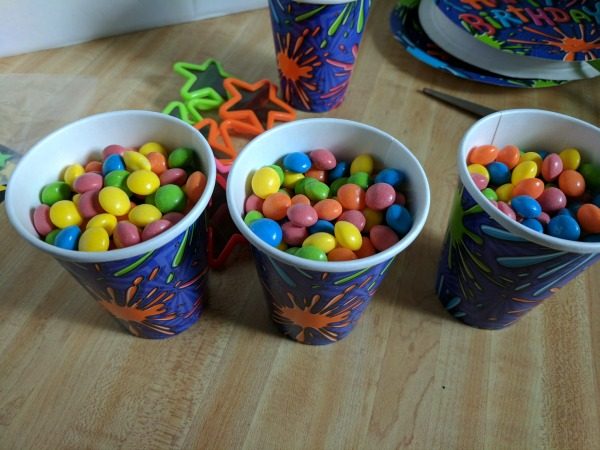 Fill party cups with candy to use as decor and party favors #BirthdaysMadeBrighter #CollectiveBias #Shop