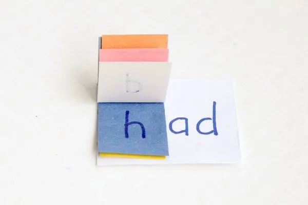 Stack the first letter and flip through to practice word families