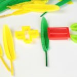 Looking for fall or Thanksgiving themed math activities for kids? This Fun Feather Addition Game is a great way to combine the season and learning! Check out our tips for how to use common items to teach your children! #math #kidsactivities #homeschool #addition