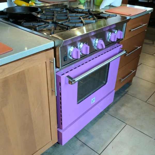 Purple stove in That Cooking School kitchen studio