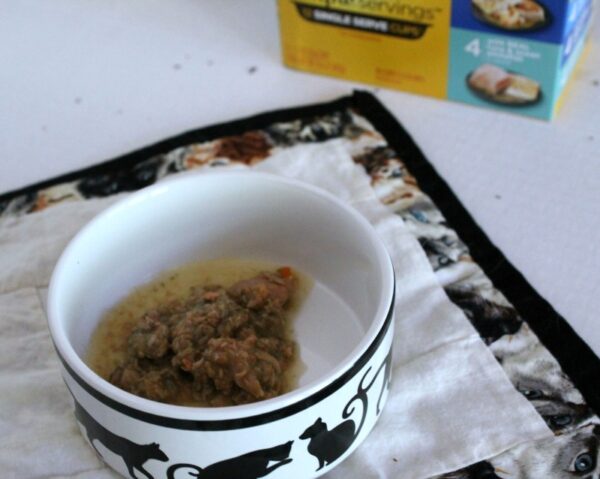 Easy to serve Meow Mix Simple Servings in the cat bowl