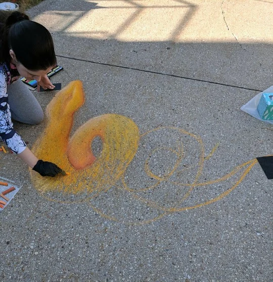 Chalk art in progress at Art Infusion Janesville