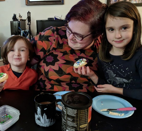 Darcy spending time with her kids during cookies and cocoa time.