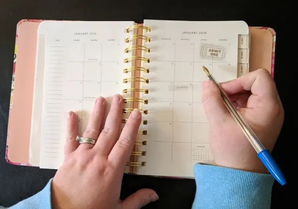 Using planner for meal planning and keeping track of activities.