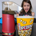 Making popcorn for family movie night