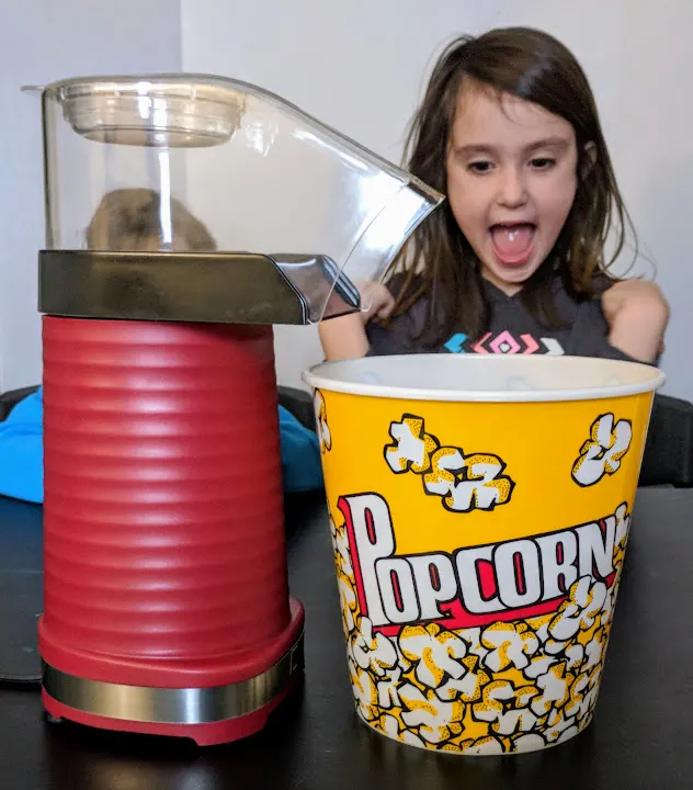 Making popcorn for family movie night