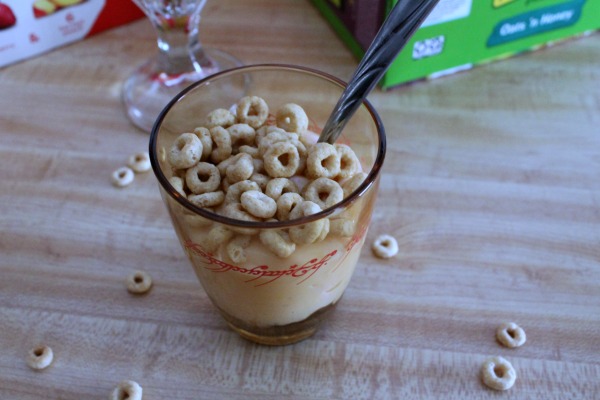 Yogurt parfait topped with Honey Nut Cheerios