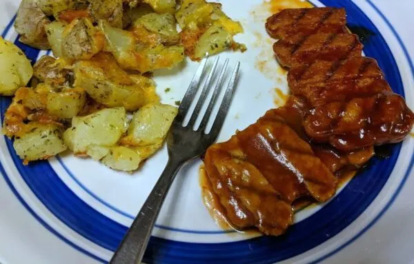 Simple dinner solutions with On-Cor Boneless Rib Patties and a side of oven roasted potatoes.
