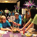 Young girls engaging in hands on engineering activities at SWENext DesignLab