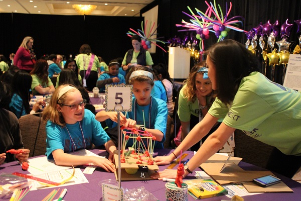 Young girls engaging in hands on engineering activities at SWENext DesignLab