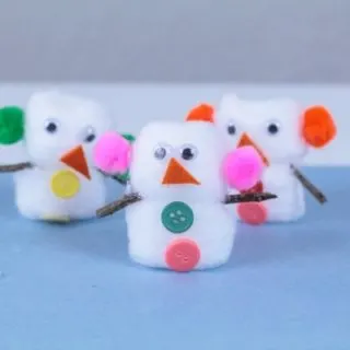 Cotton ball snowman kids craft activity