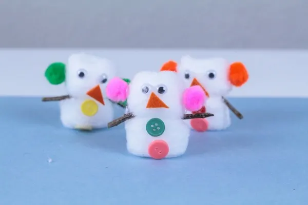 Cotton ball snowman kids craft activity