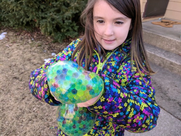 Rissa playing with the huge Wubble Fulla Marbles.