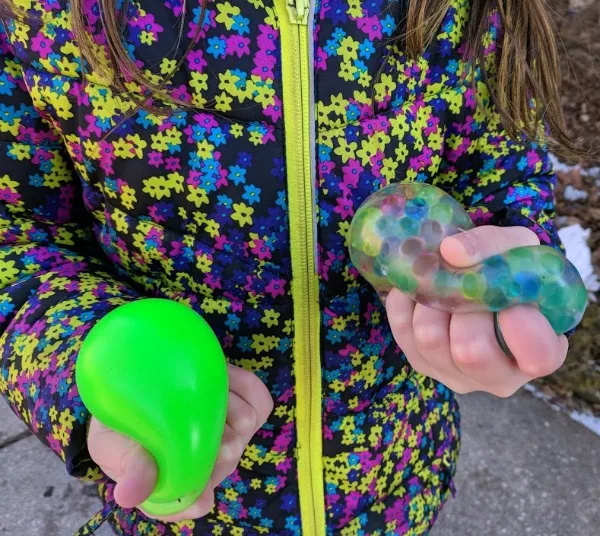 Squeezing tiny wubble fulla balls provides fun sensory play.