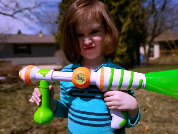 My son playing outside with his Slime Blaster toy.