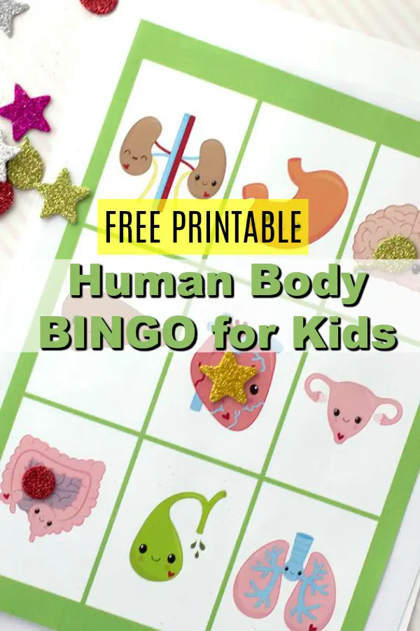 Human body part themed printable BINGO card on table with glittery tokens on it.