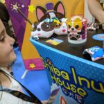 My daughter learning how to play Circus Puppy at Origins Game Fair