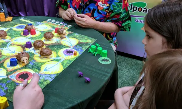 My kids learning how to play Echidna Shuffle at Origins.