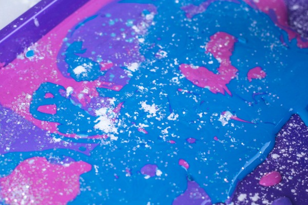Add glitter to look like stars in your galaxy oobleck.
